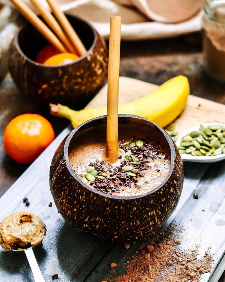 vegan recipe smoothie peanut butter with spoon and natural bamboo straw